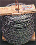 ROLL OF BARBED WIRE FENCING